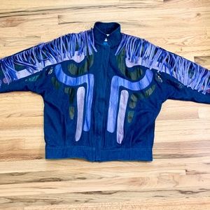Vintage blue denim bomber jacket with leather and snake skin appliqué and fringe